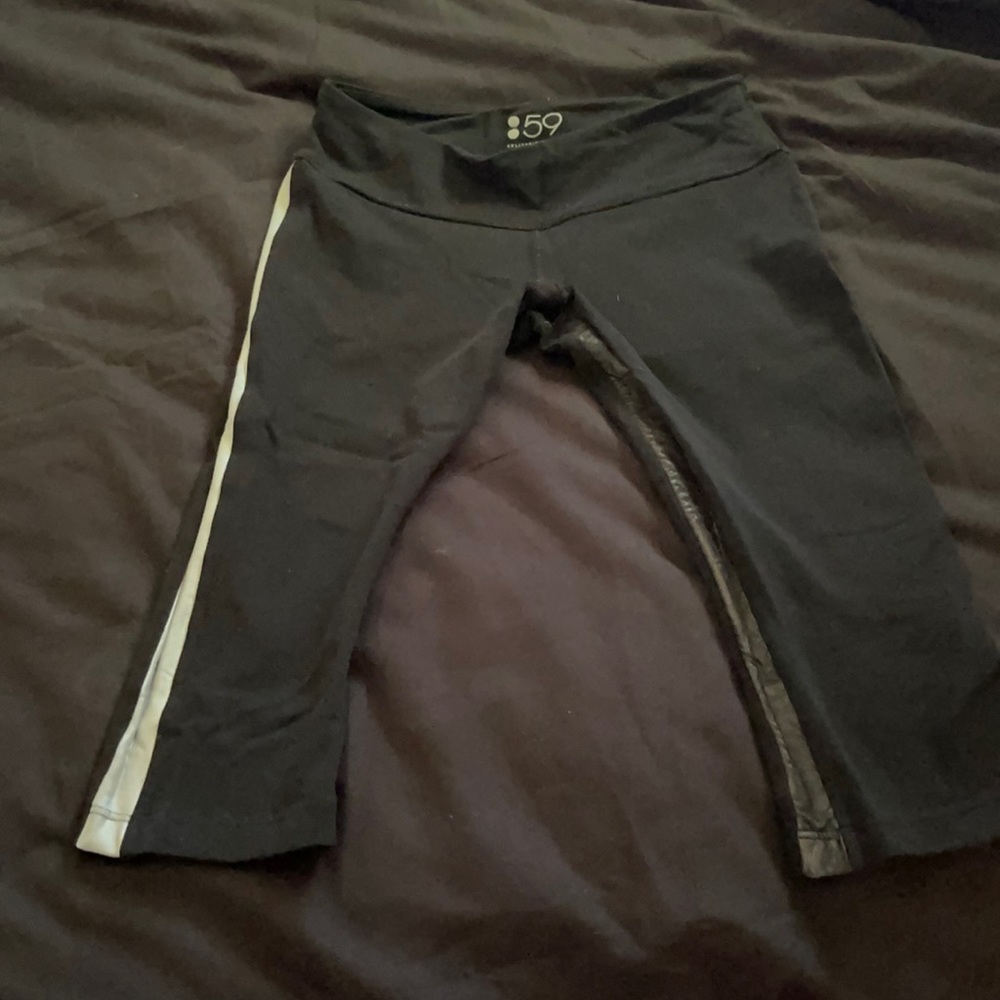 Splits 59 Capri yoga pants. Two stripes on side.